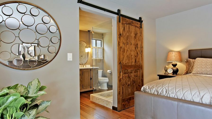 sliding barn door would be a space-efficient option