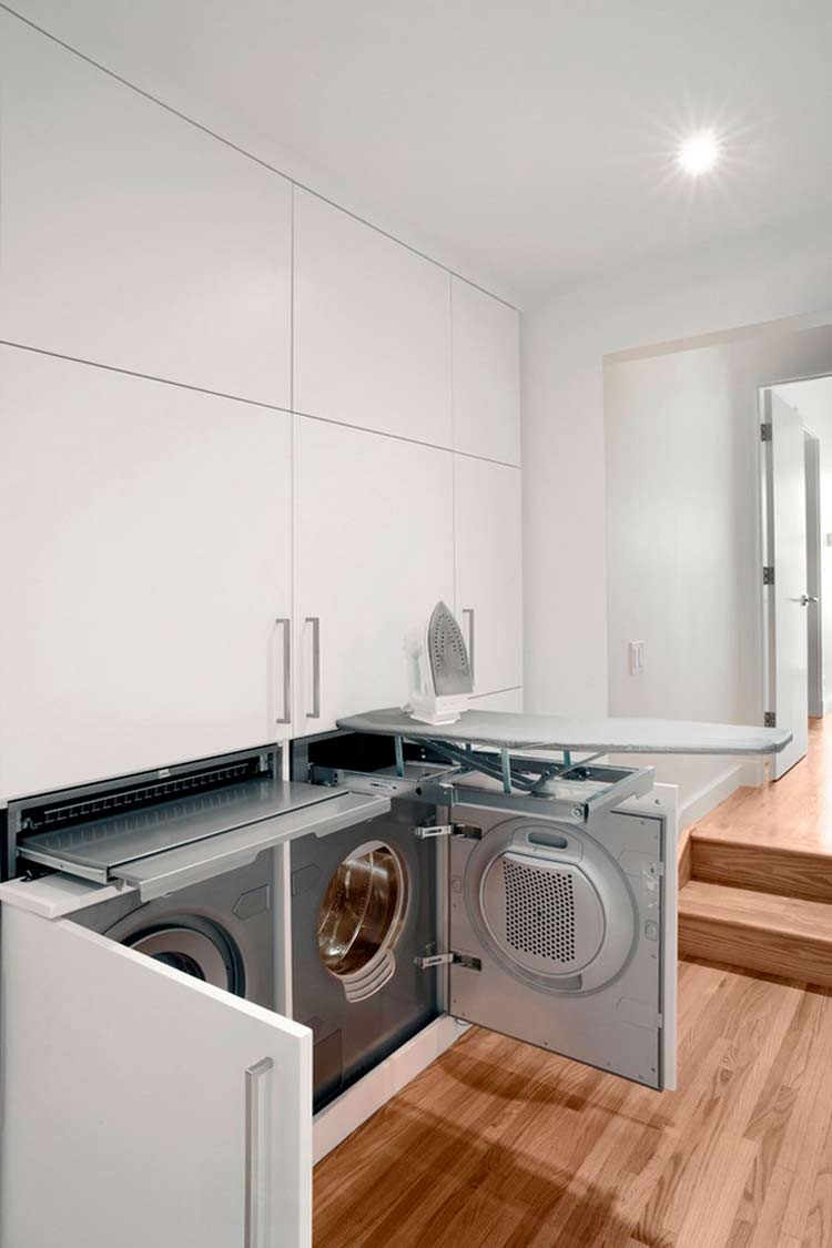 Built in laundry room with iron board