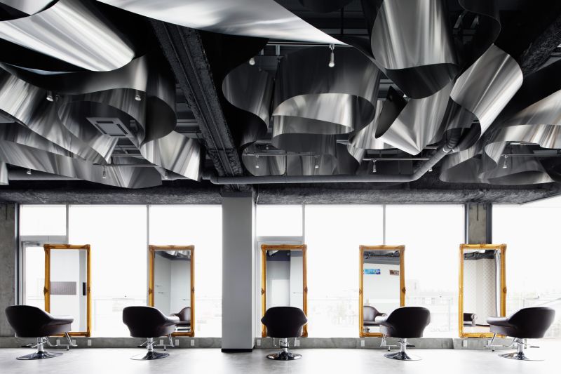 ARKHE Beauty Salon with an impressive ceiling and gold mirrors