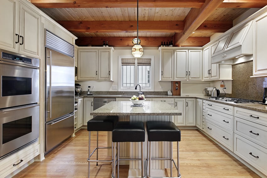 Custom white u shaped kitchen design