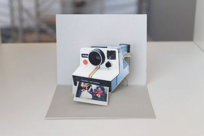 A personalised polaroid pop up card - photo gifts - http://www.brit.co/pop-goes-the-diy-pop-up-name-card/
