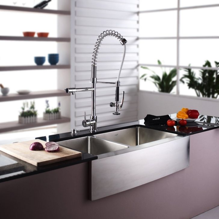 Modern faucet in the kitchen in high-tech style