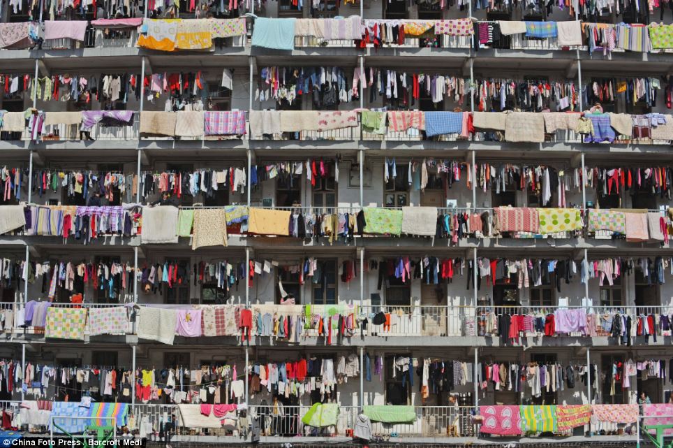 Rainbow of washing: Sheets and clothes are hung out to dry in the sun at Hubei University of Traditional Chinese Medicine