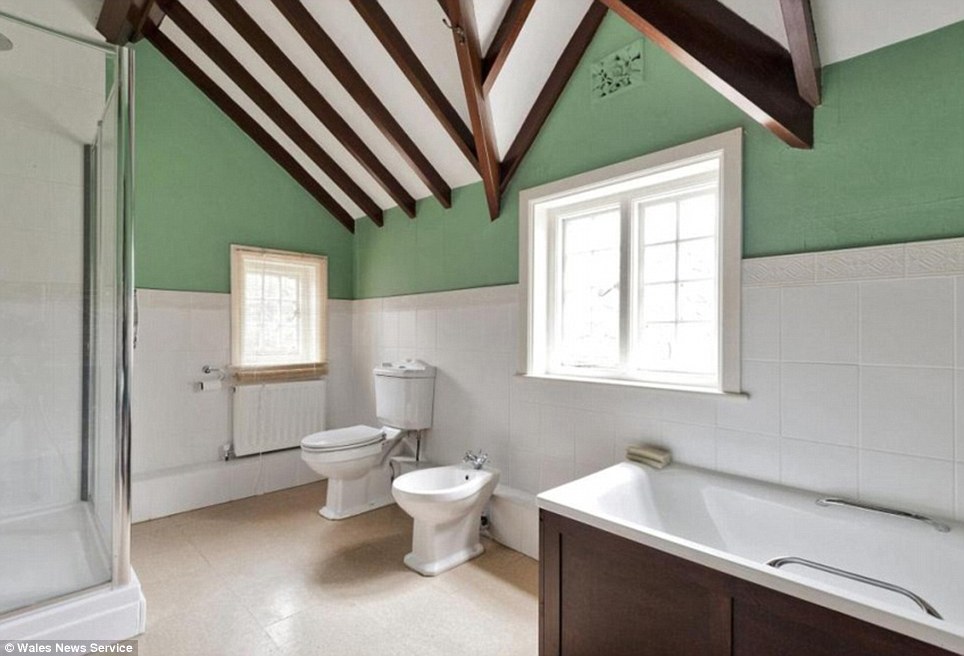 Stately: Even the bathroom features angled timber work