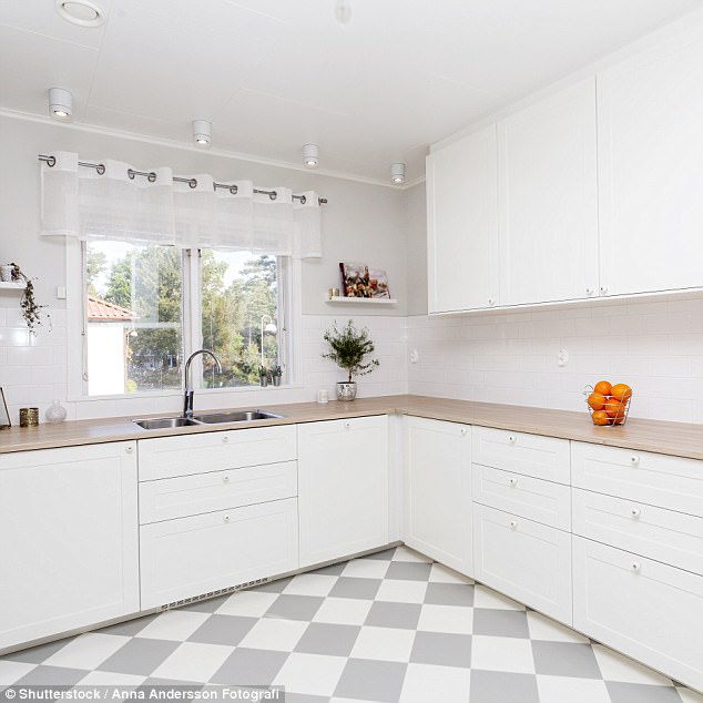 If you have a large kitchen you should avoid making it all-white as it can make it appear cold and clinical. Grey tones can help make it appear more warm and friendly