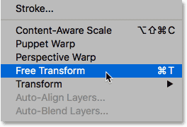 Selecting Free Transform from under the Edit menu in Photoshop.