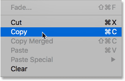 Choosing the Copy command from under the Edit menu in Photoshop.