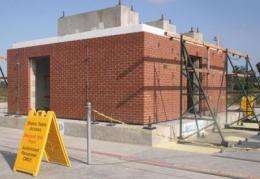 One-story masonry building survives strong jolts during seismic tests