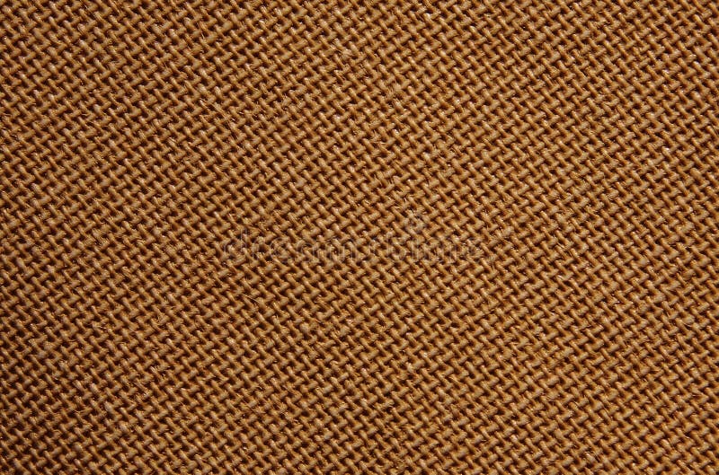 Brown burlap fabric texture close up. Rough canvas background stock photo
