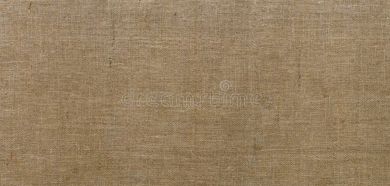 Burlap texture. Sackcloth rustic canvas background. Large piece of rough fabric woven of flax, jute or hemp. Design element. Top view stock image