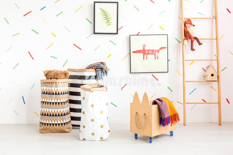 Child room with toy bags. And wooden box stock photo