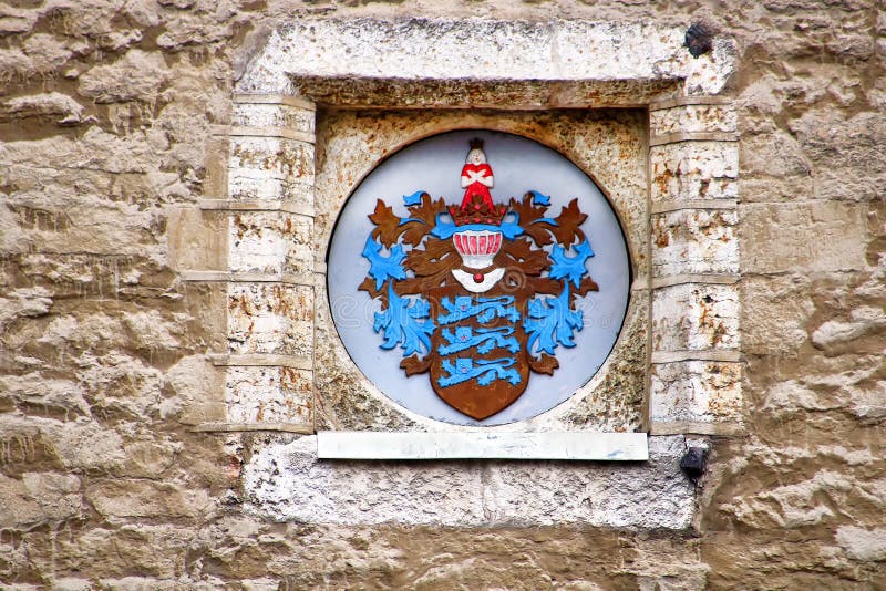 The coat of arms on the wall of the Tallinn town hall, Estonia royalty free stock photography