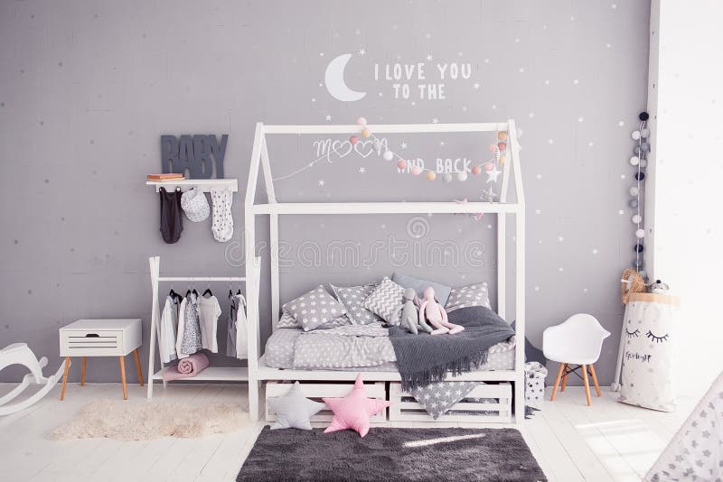 Cozy children`s bedroom in scandinavian style with diy accessories royalty free stock photography