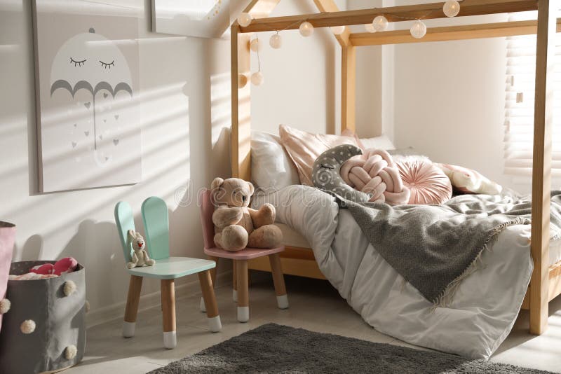 Chairs with bunny ears in children`s bedroom interior royalty free stock photography