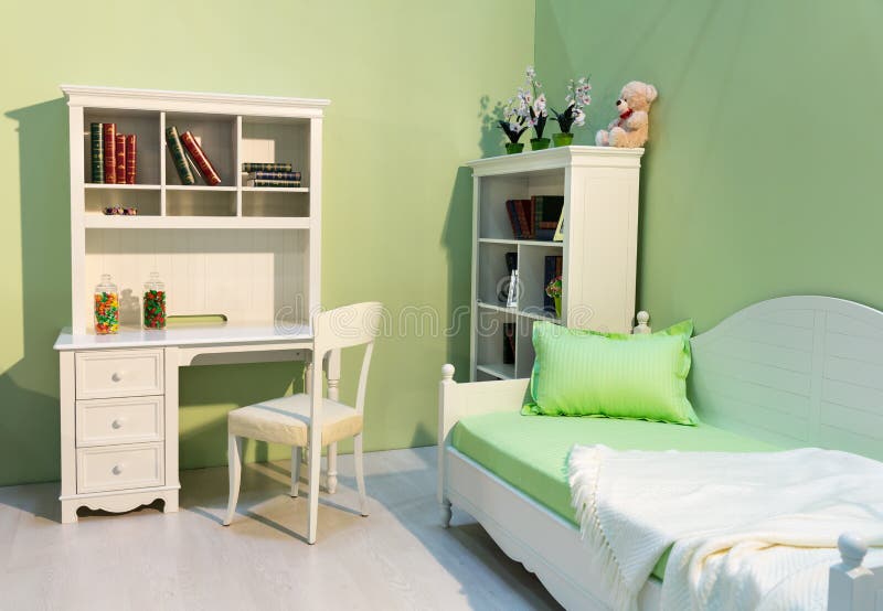 Cute child room. Spacious child room in a green color royalty free stock photography