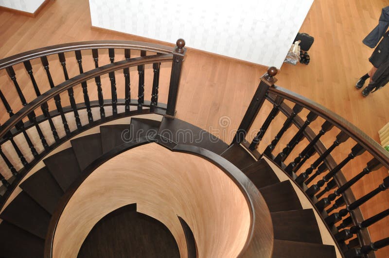 Entrance of the 2nd floor to the spiral staircase in the house. Staircase of Art Nouveau. royalty free stock images