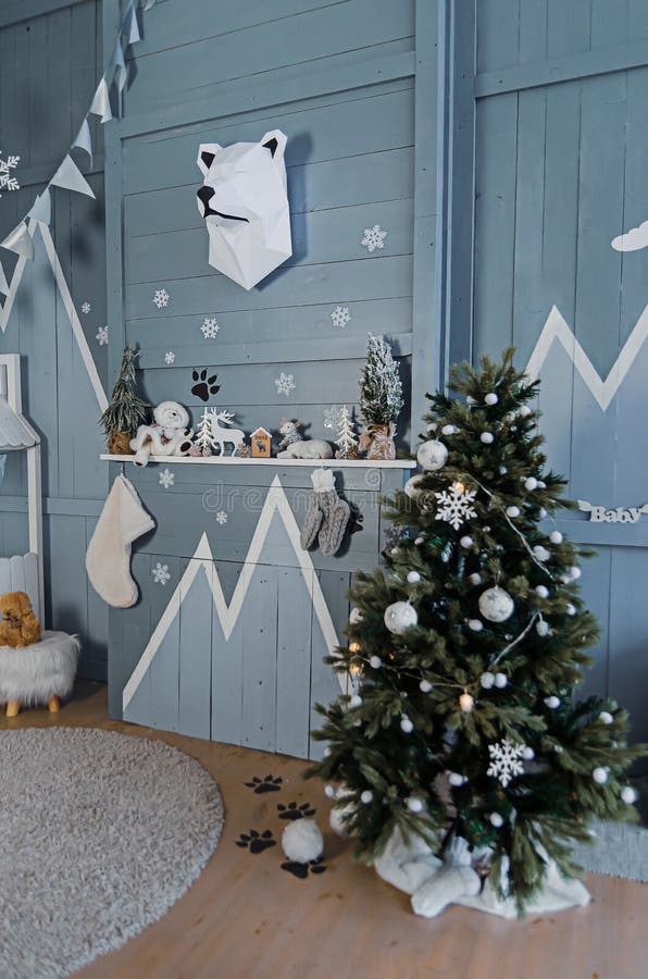 Festive decoration of a children`s bedroom for the Christmas holidays New Year. Interior solutions royalty free stock photos