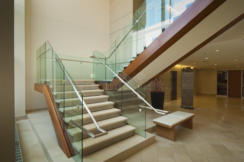 Glass and mahogany staircase stock image