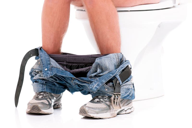 Man on toilet bowl royalty free stock image