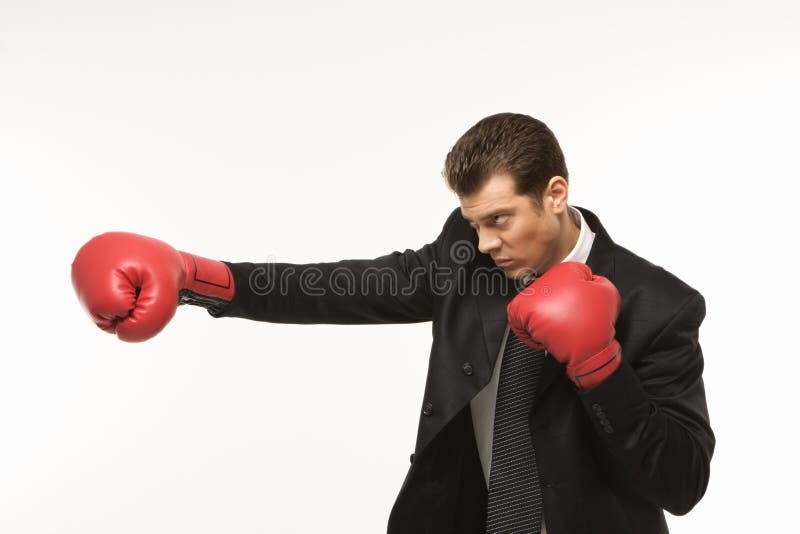 Man wearing boxing gloves stock photo