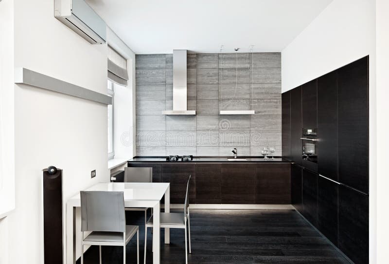Modern minimalism style kitchen interior. In monochrome tones royalty free stock photos