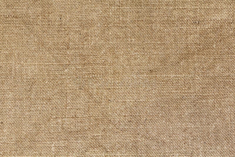 Old rough burlap texture. Old rough natural burlap texture as a background stock photos