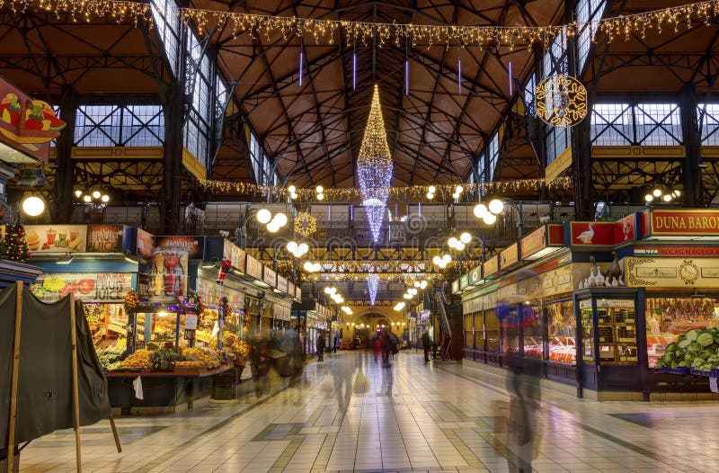 People blured in motion shopping in the Great Market Hall in Budapest royalty free stock photography