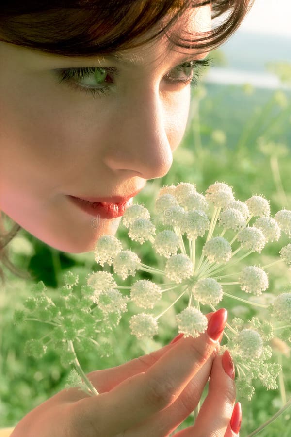 Pretty girl with flower stock photography
