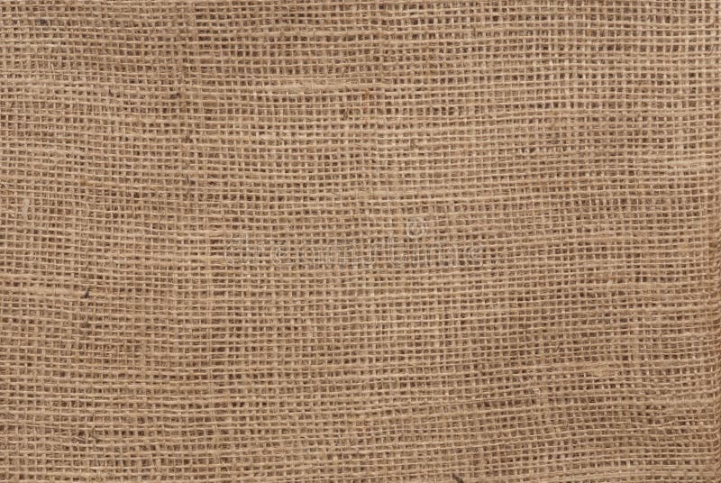 Rough natural brown burlap. Close-up of open-weave rough burlap sacking. Makes good background stock photos