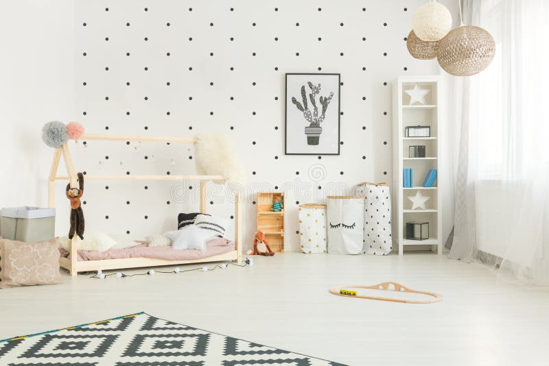 Scandi style child room. Scandi style, white child room with diy house bed stock images