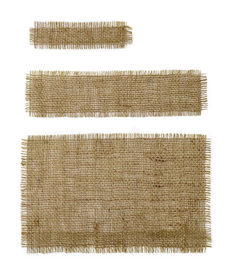 Three burlap rectangular and oblong pieces isolated on white background. Natural color sackcloth patch with torn edges. Rough. Fabric woven of flax, jute or stock image