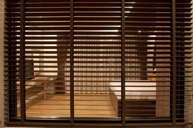 Vertical blinds. In the bedroom royalty free stock photography