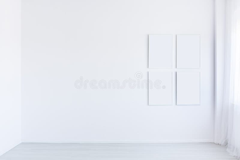 White autistic child`s room. Mockup of white posters gallery in white autistic child`s empty room, copy space interior concept stock photos