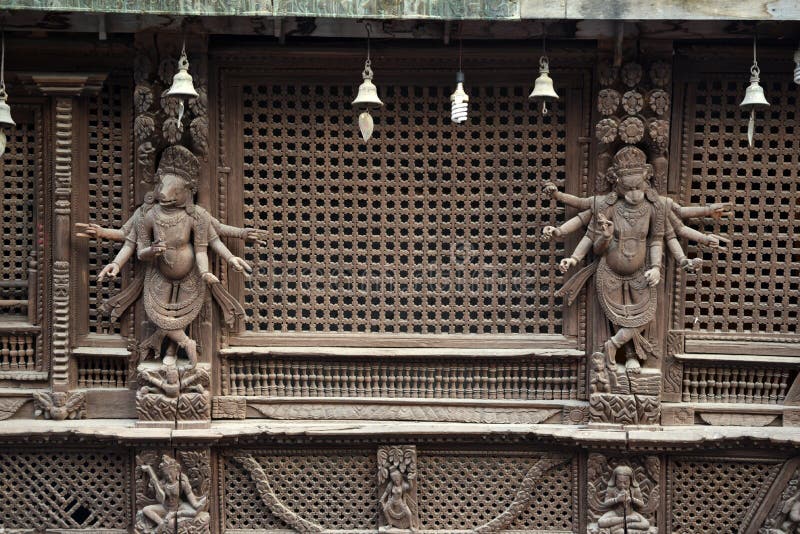 Wooden carvings on a Hindu temple in Kathmandu, Nepal. Now destroyed by the powerful earthquake that hit Nepal royalty free stock image