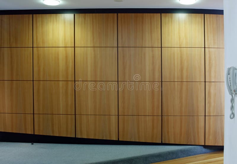 Wooden hall wall background. Light falling on wooden hall wall stock photography