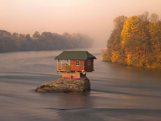 house on rock in the river