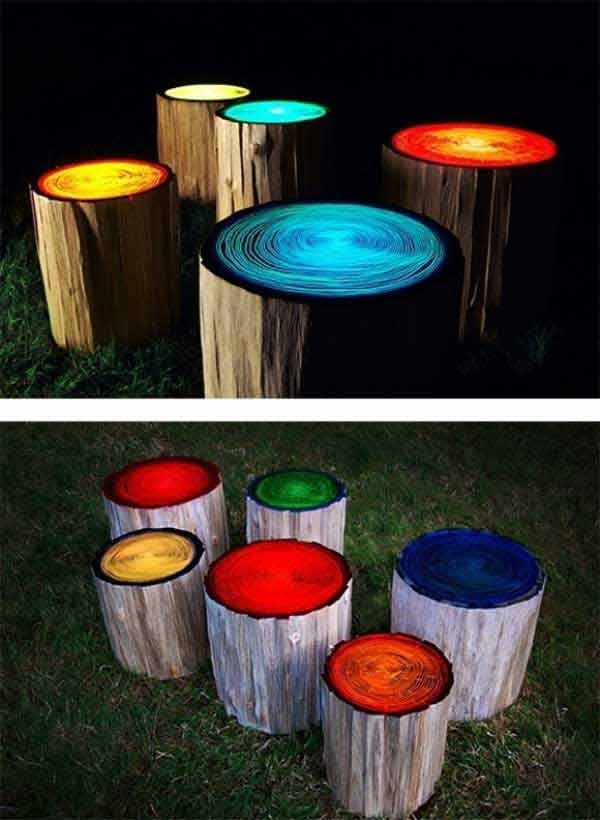 Log-stools-painted-with-glow-in-the-dark-paint