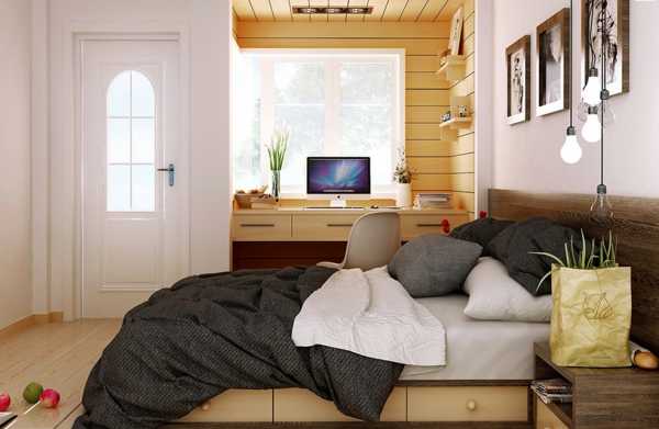 Спальня с двуспальной кроватью и компьютерным столом