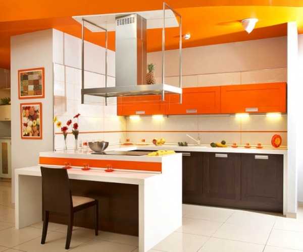 Оранжевая кухня и зеленый фартук